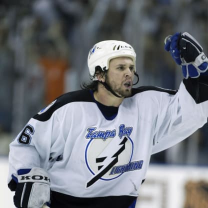 Right wing Martin St. Louis #26 of the Tampa Bay Lightning celebrates a victory over the New Jersey Devils in the 2003 Eastern Conference Stanley Cup semifinals at the St. Pete Times Forum on April 28 , 2003 in Tampa, Florida. The Lightning won 4-3. (Photo by Andy Lyons/Getty Images/NHLI)