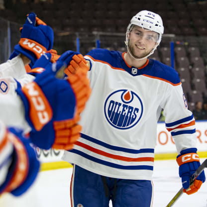 A fan made Flames jersey that is being paired up against an Oilers