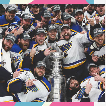 The moment Pat Maroon put a baby in the Cup during the Blues parade