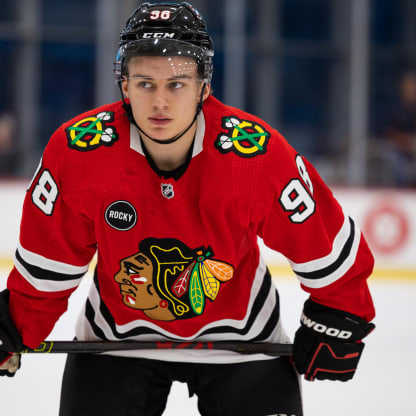 Bedard scores hat trick in Blackhawks debut at Tom Kurvers