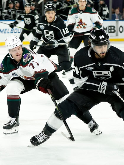Kings hold off Coyotes to split NHL Global Series