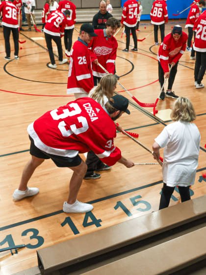 Red Wings prospects help grow sport of hockey at Blair Elementary School