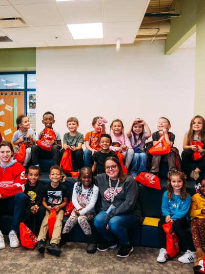 ‘Giving back to the community is awesome’: Kasper surprises, reads to first graders at Madison Elementary