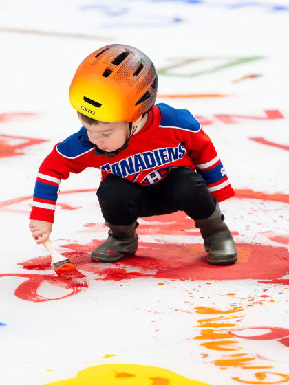 Fan Club members paint the Bell Centre ice
