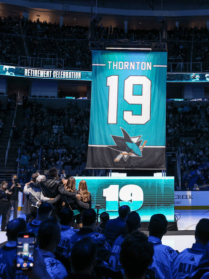 Scrolling Social: Teal Legends Celebrate as #19 Goes to the Rafters