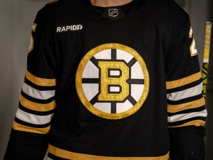 Bruins unveil new logo for centennial season - CBS Boston