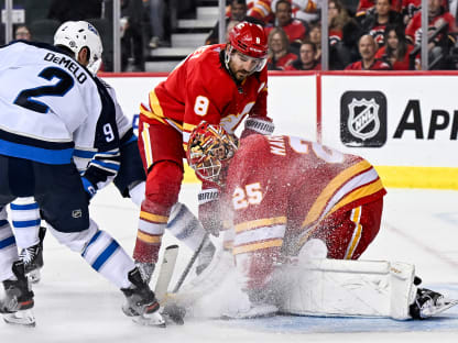 Winnipeg Jets preseason vs. Calgary Flames tonight, Connor Hellebuyck  starts in goal 