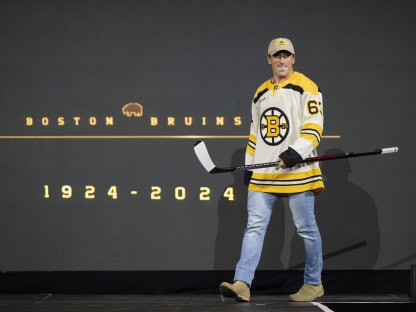 Bruins Model Centennial Jerseys at JetBlue Takeoff Event