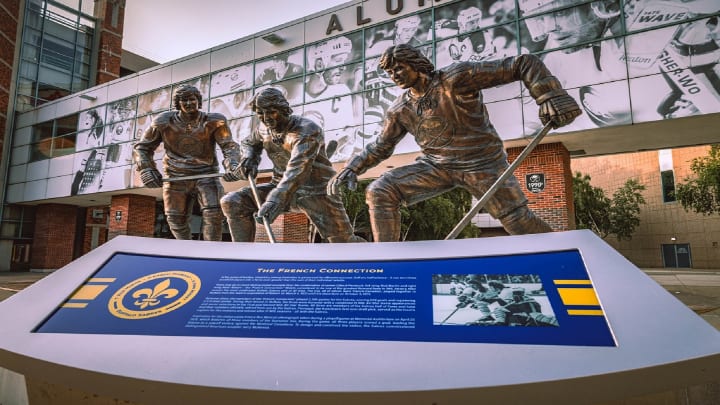 Zoom background of the French Connection statue located in Alumni Plaza outside KeyBank Center