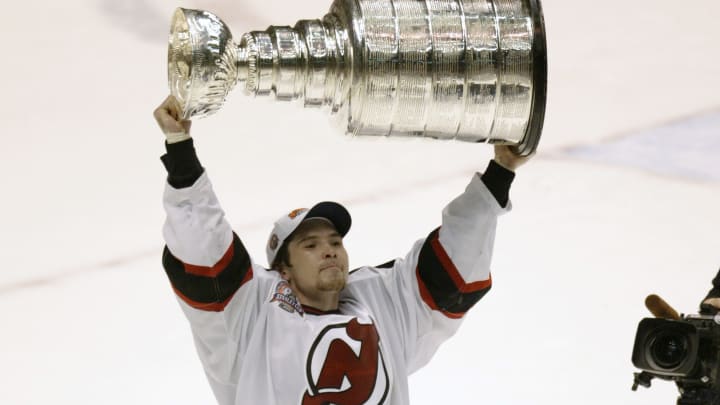 Sergei Brylin raises the Stanley Cup in 2003.
