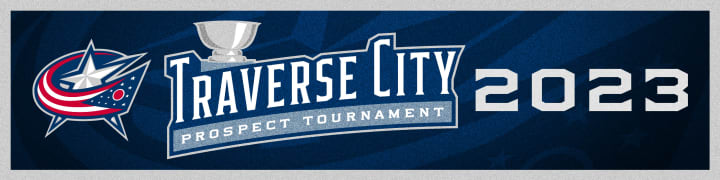 Blue graphic with grey border. Blue Jackets primary logo to the right. Logo reading Traverse City Prospect Tournament in large white text at center. Large grey text reading 2023 to the right.