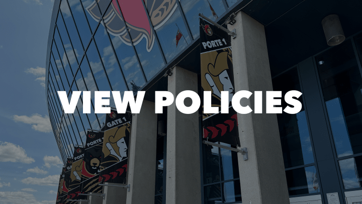 Photo of the front of the Canadian Tire Centre with the words "View Policies" in white letters.