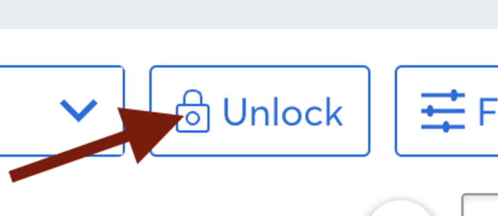 Screenshot of Ticketmaster Event Page unlock button with an arrow overlaid on the graphic pointing to the button indicating it's geographical location on the page – to the left of the filter button.