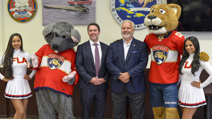 Matt Caldwell, Jerry Plush, and Florida Panthers mascots and dance team